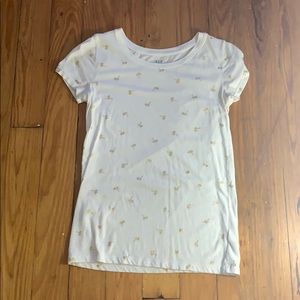 white shirt with gold palm trees